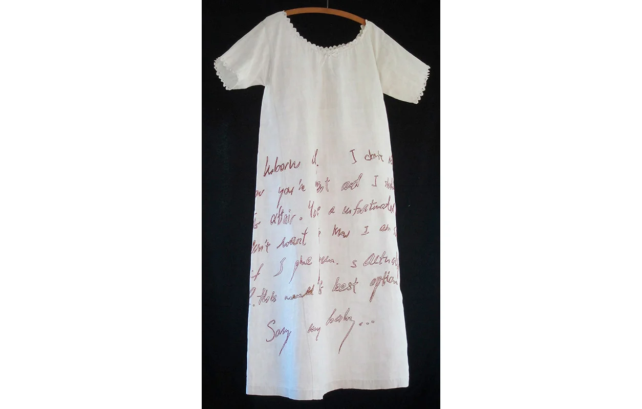 Unborn Child 3 , Embroidery on old cotton gown with old wooden hanger, front, 46" x 31" dress only, 51" x 31" with hanger