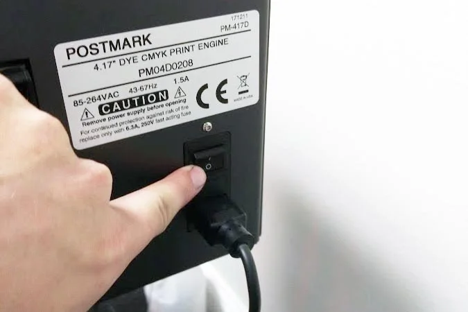 30. After powering on the printer, press next in the parts replacement utility to restart the printer out of maintenance mode. The printer will begin to load ink - this process takes approximately 25 minutes. Note it is important that there is at least 20% ink in the cartridge for this process to finish. After ink has been loaded, the printhead can be returned to its normal height and position and parts replacement has been complete. For further information and details on this process, please reference the service manual at the following download link: PM-417 Service Manual Also, for more detail on the removal process of the blade cleaner and printhead see the following reference video of an older model printer: