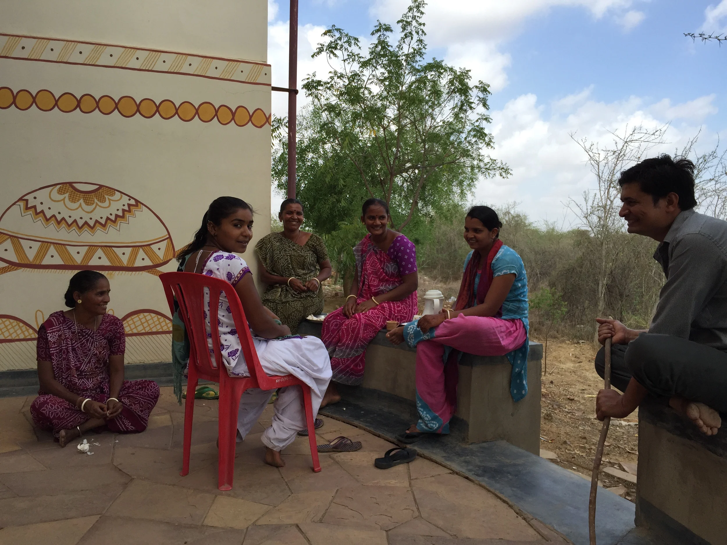 The women of Khamir, along with the cook. The woman on the left and the one in the pink and purple sitting in the middle are the ones that call me "Megan Ben".