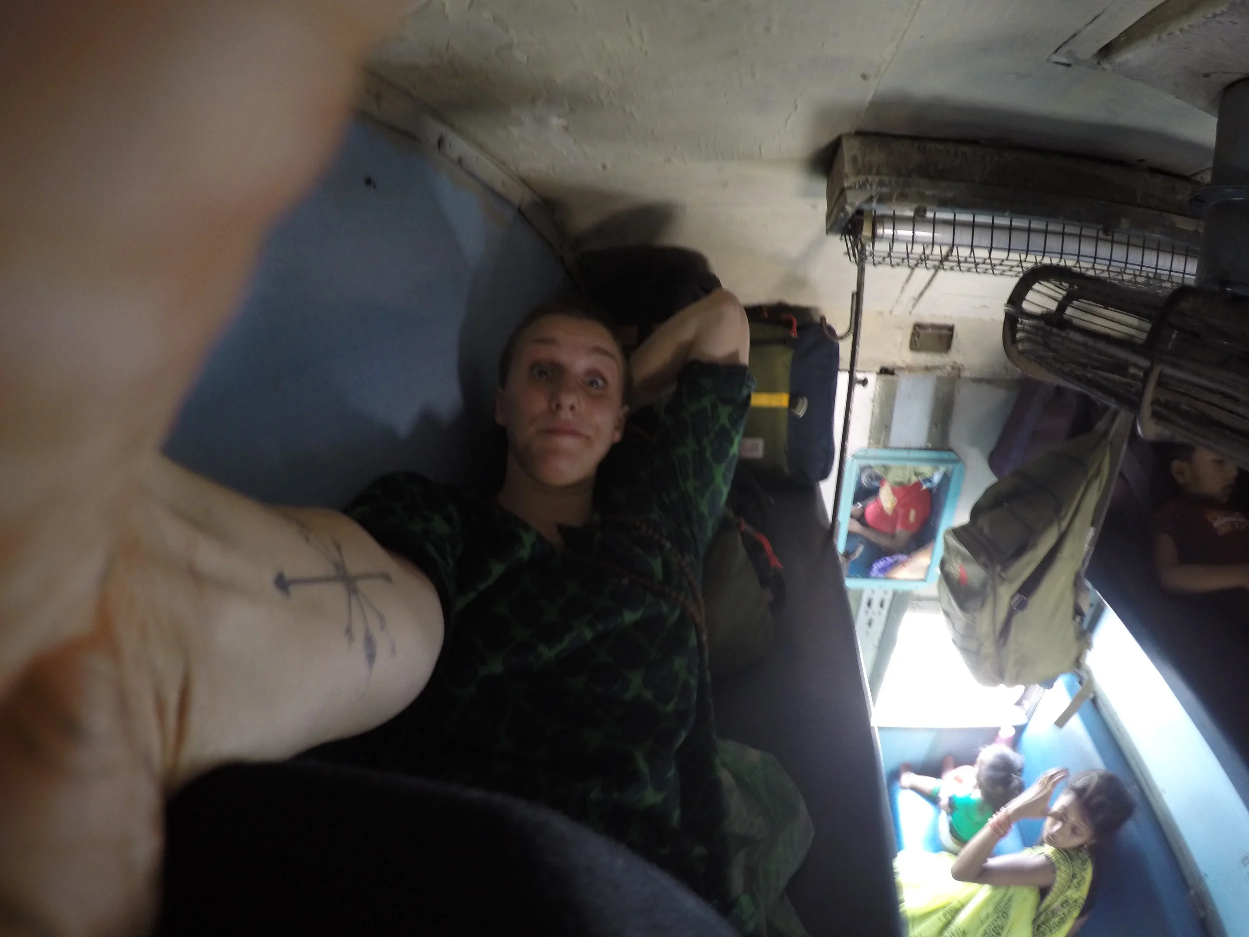 Top bunk non-AC digs for a long journey from Haridwar to Varanasi.