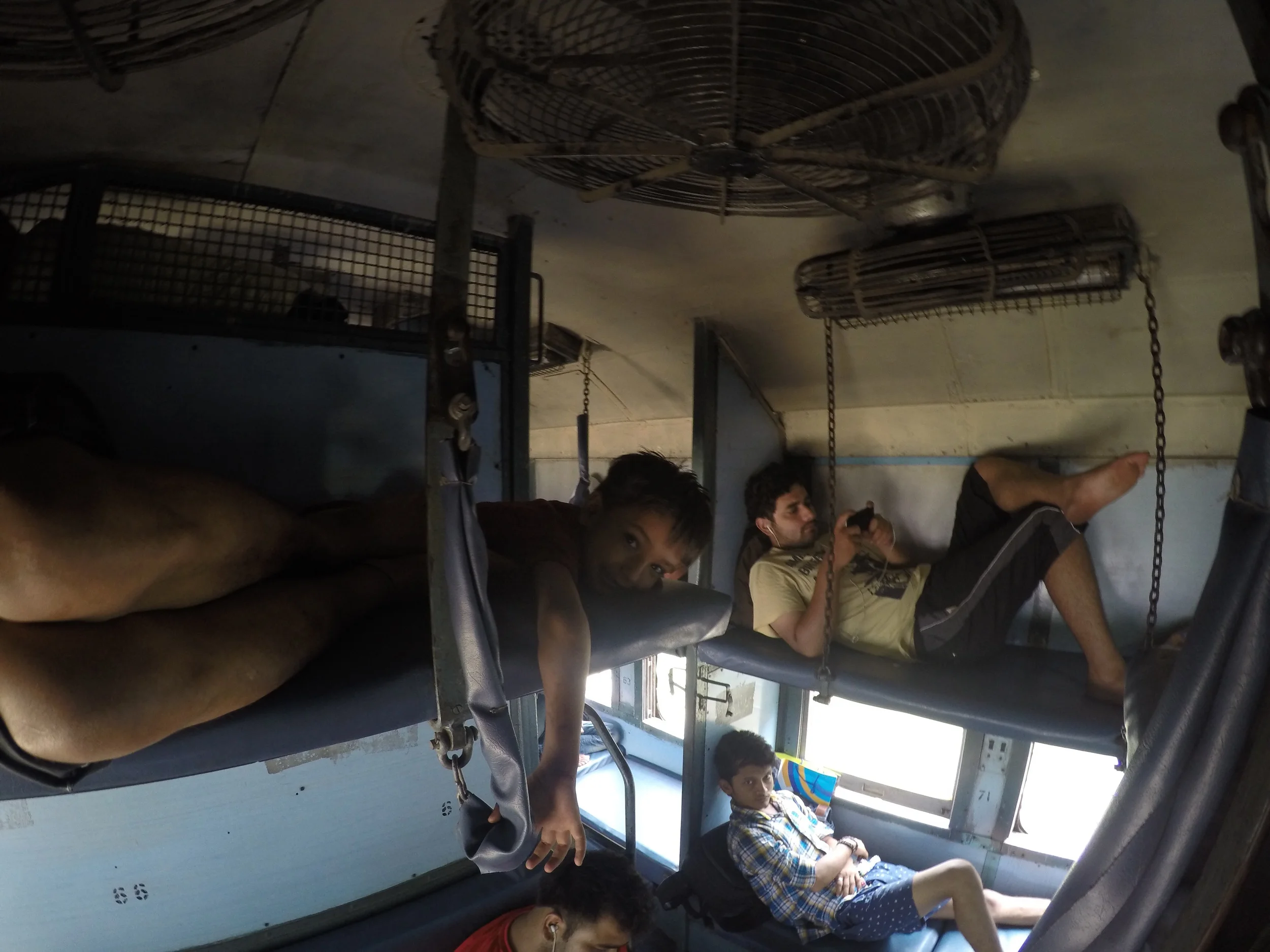 New best friend. And yes, that boy kiddy-corner below stared at me for much of the journey, though was harmless. Top bunk yellow shirt is the masturbator.
