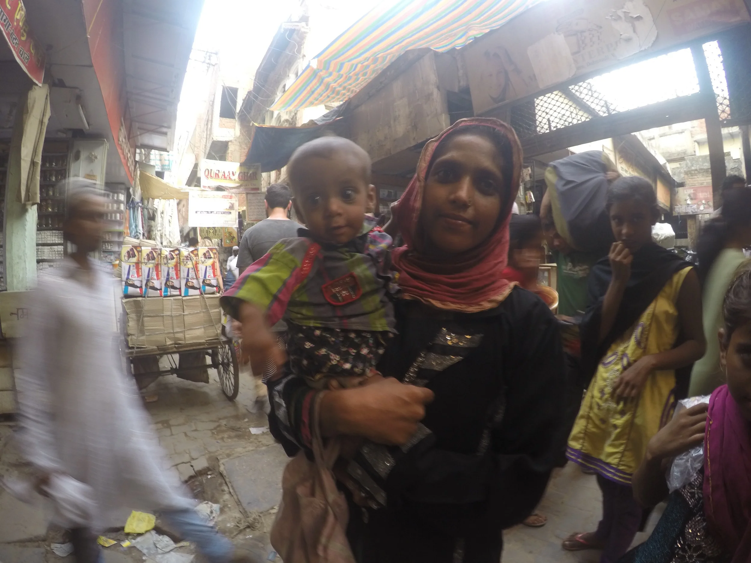 This happens quite often - this woman saw white skin and came up to me offering for me to take a picture of her baby, then asked for money. Her daughter, whom is in the right of the frame and can't be seen, did not have a functioning right eye. I'm hoping this was not done on purpose to the child in an effort to get money for the family, but it's very likely it was.