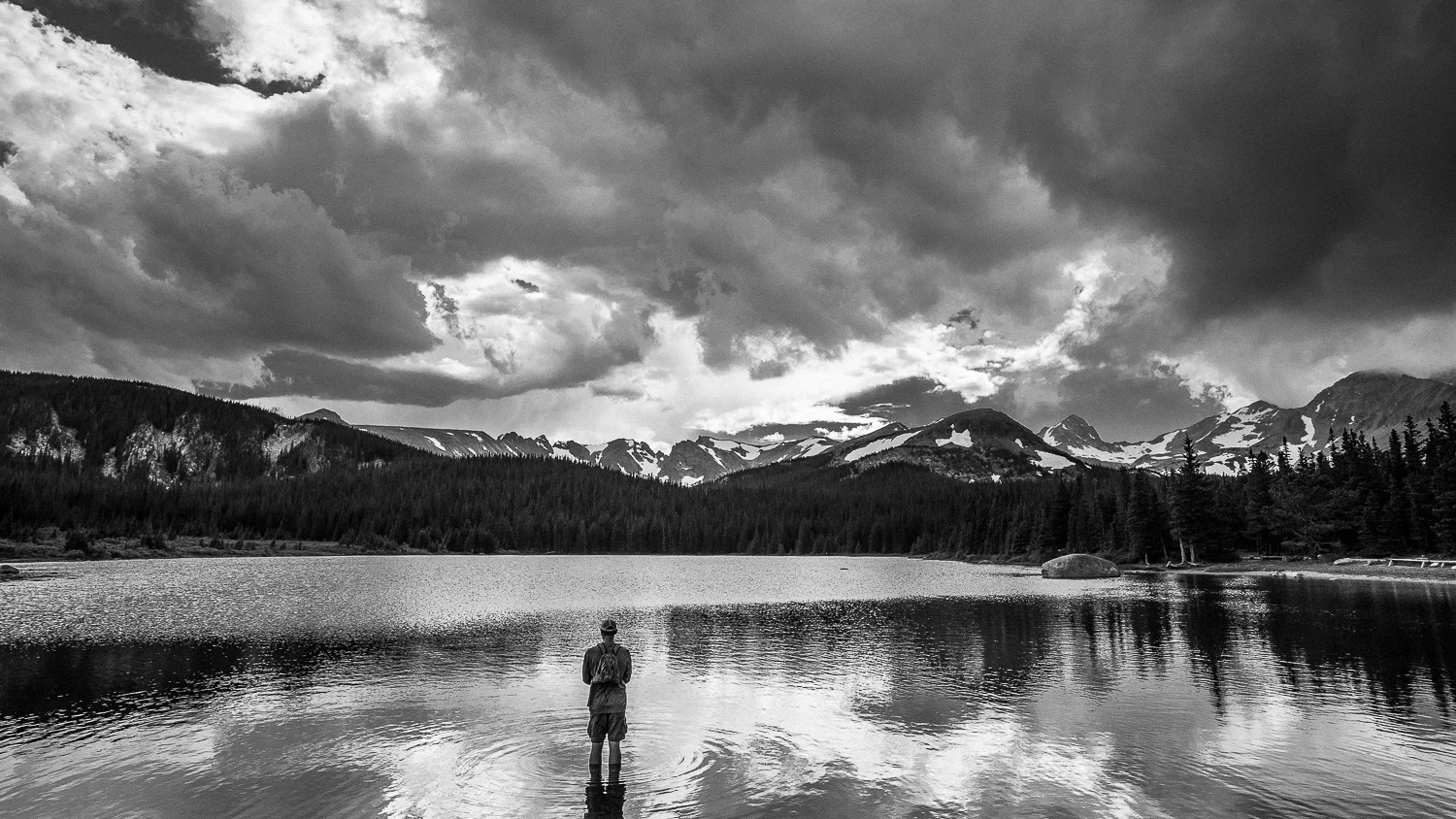 High alpine fly fishing as the storm clouds roll in.