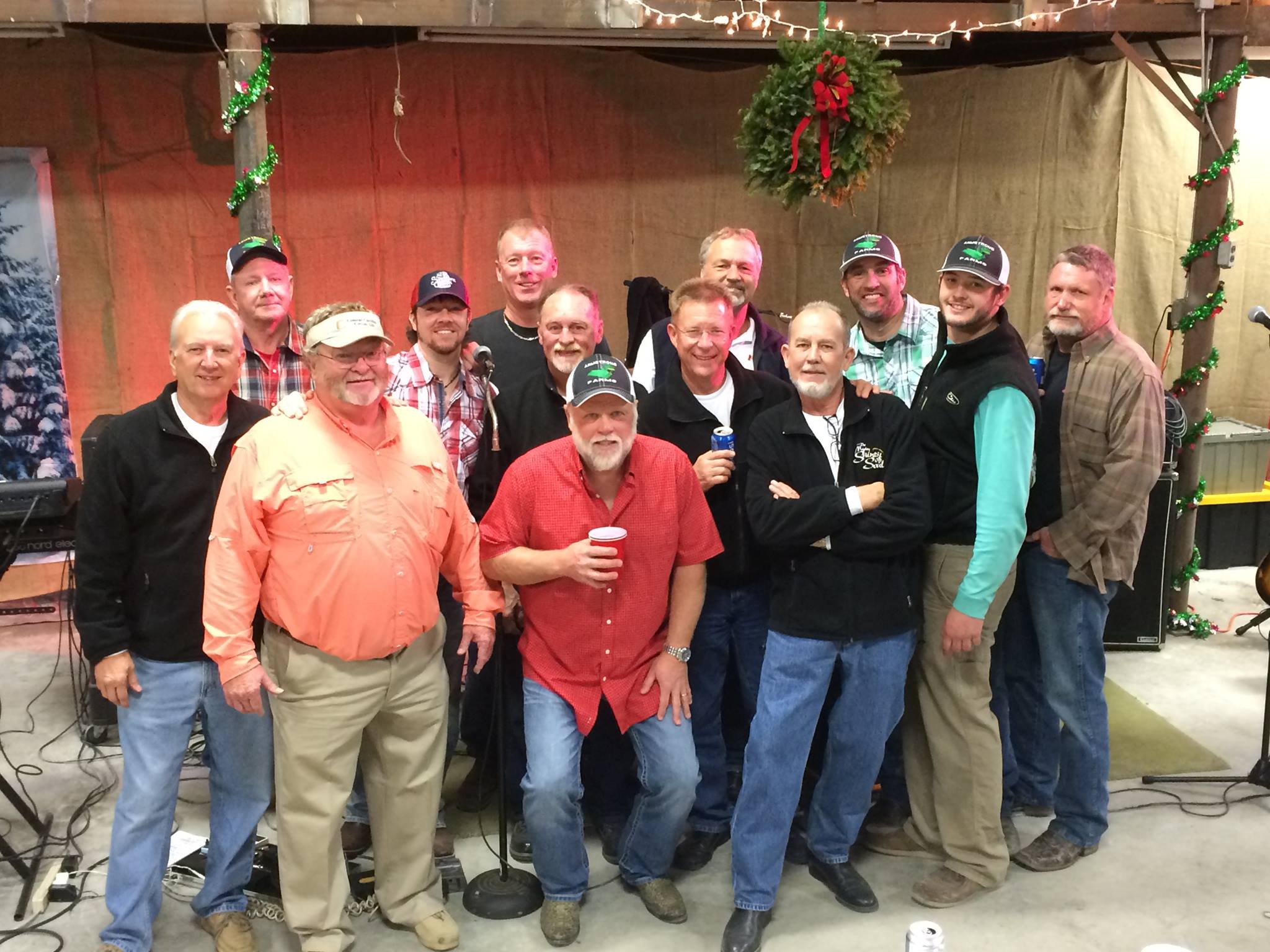 Christmas at Mike Harris Farms Pictured left to right are: Randy Hignite, Dennis Martin, Mike Harris, Tim Cifers, Delbert Armstrong Danny Garner, Kevin Armstrong, Johnnie Byrd, Jim Heidenreich, Dick Feyer, Chris Armstrong, Elliot Sadler, Will Arterburn.