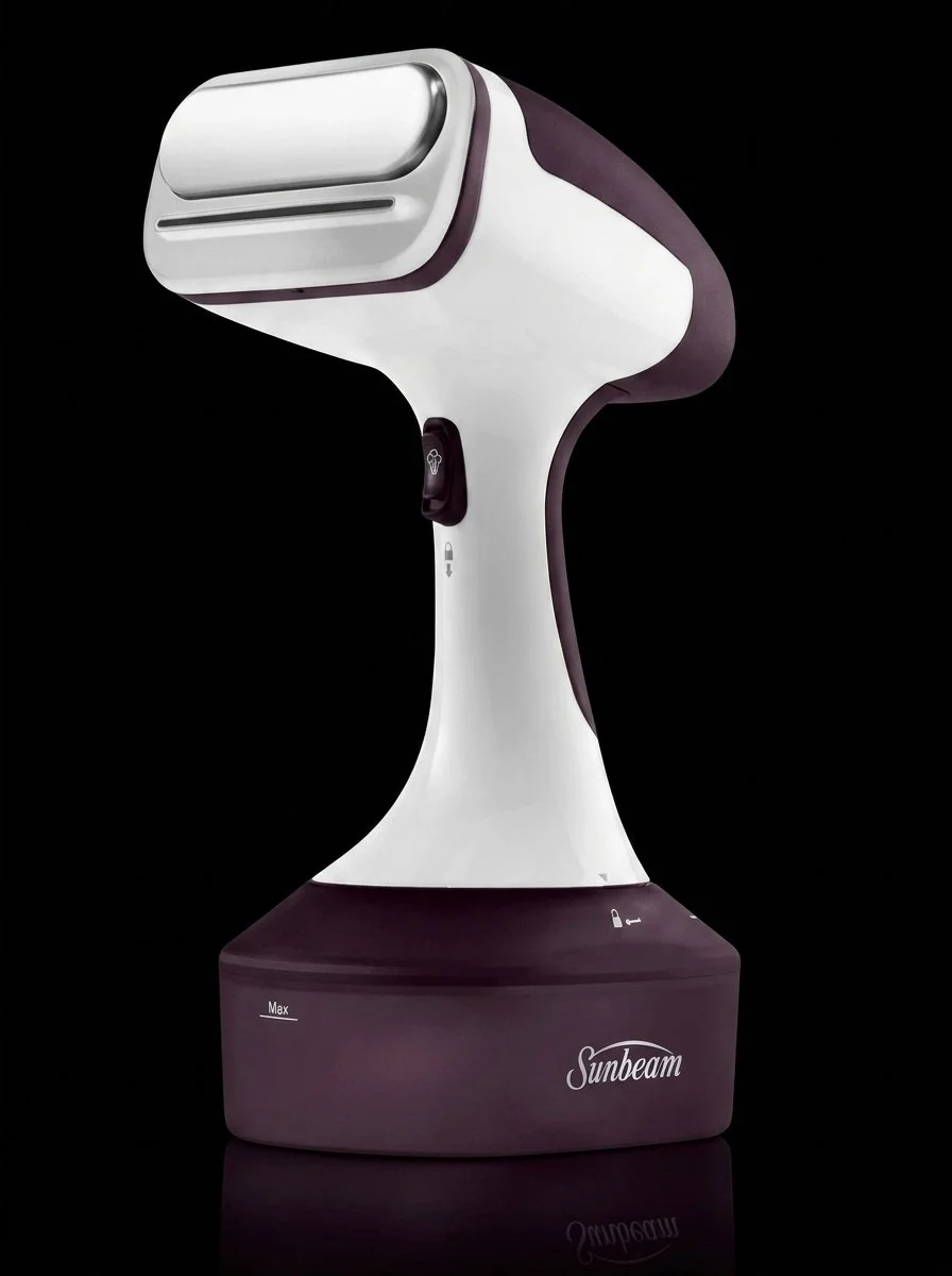 Handheld clothes steamer.