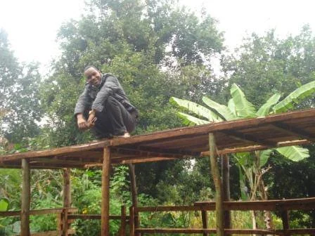  Joseph on top of the unfinished shed