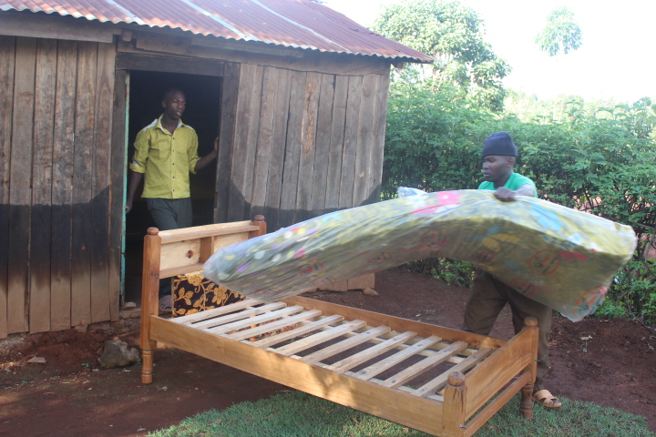 After realizing the sponsored kids in the village were sleeping on boards, we got them some new, comfortable beds. 