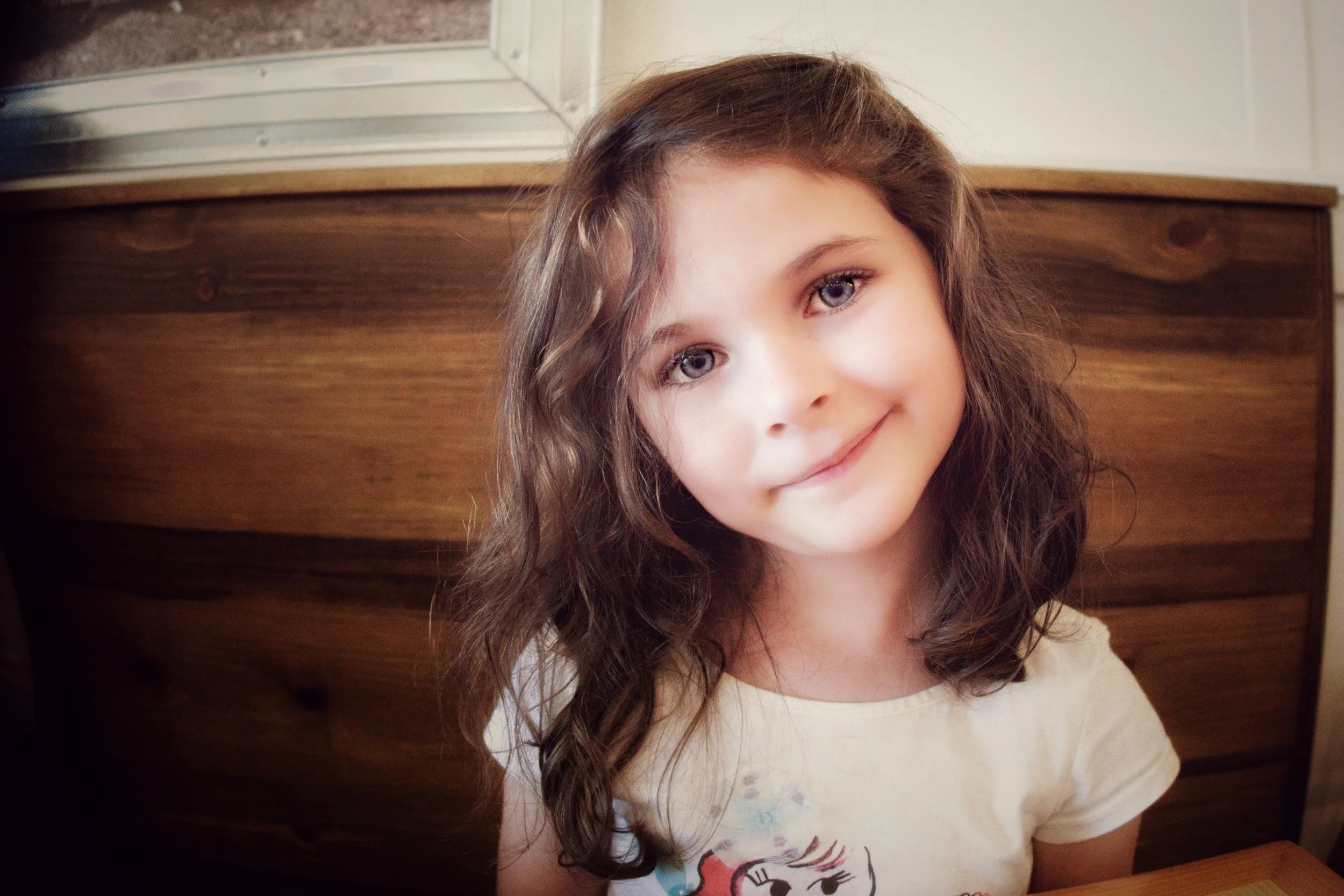 I took this with my iPhone 7, and I love the shot - if only because my daughter actually gave a halfway normal smile for once. That's a rarity. Trust me. 