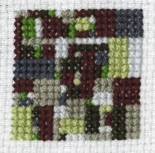 (1) When I Cross-Stitch I Feel Like a Machine: 88 Hours of Self-Love and Self-Reflection (Detail), 1.5 ”x1.5”, Embroidery floss on canvas, Mallory Donen, 2017