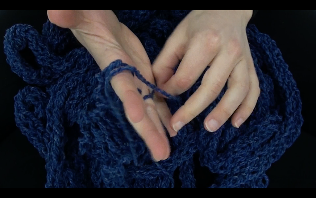 The Machine_Knitting Ouroboros (Video Still).png