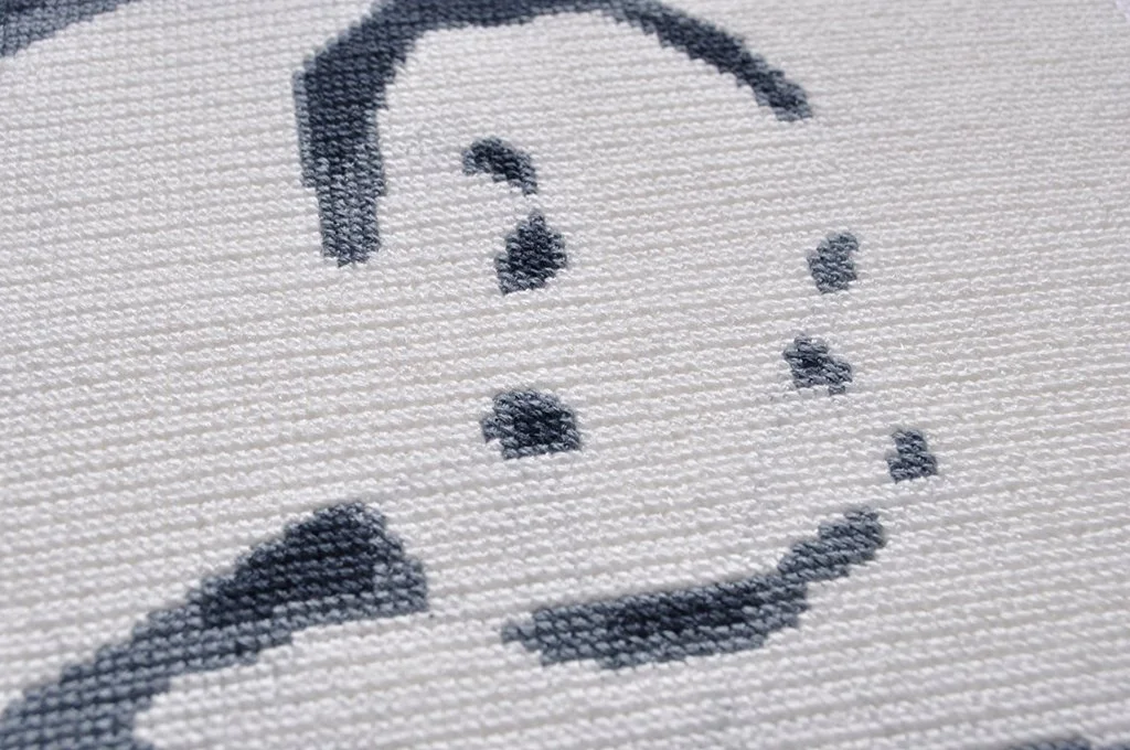  (Detail)  Becoming a Pixel - Portrait 3/5 , 2022, embroidery floss, Aida cloth⁠, 7 x 7 inches, 31.25 hours of labour 