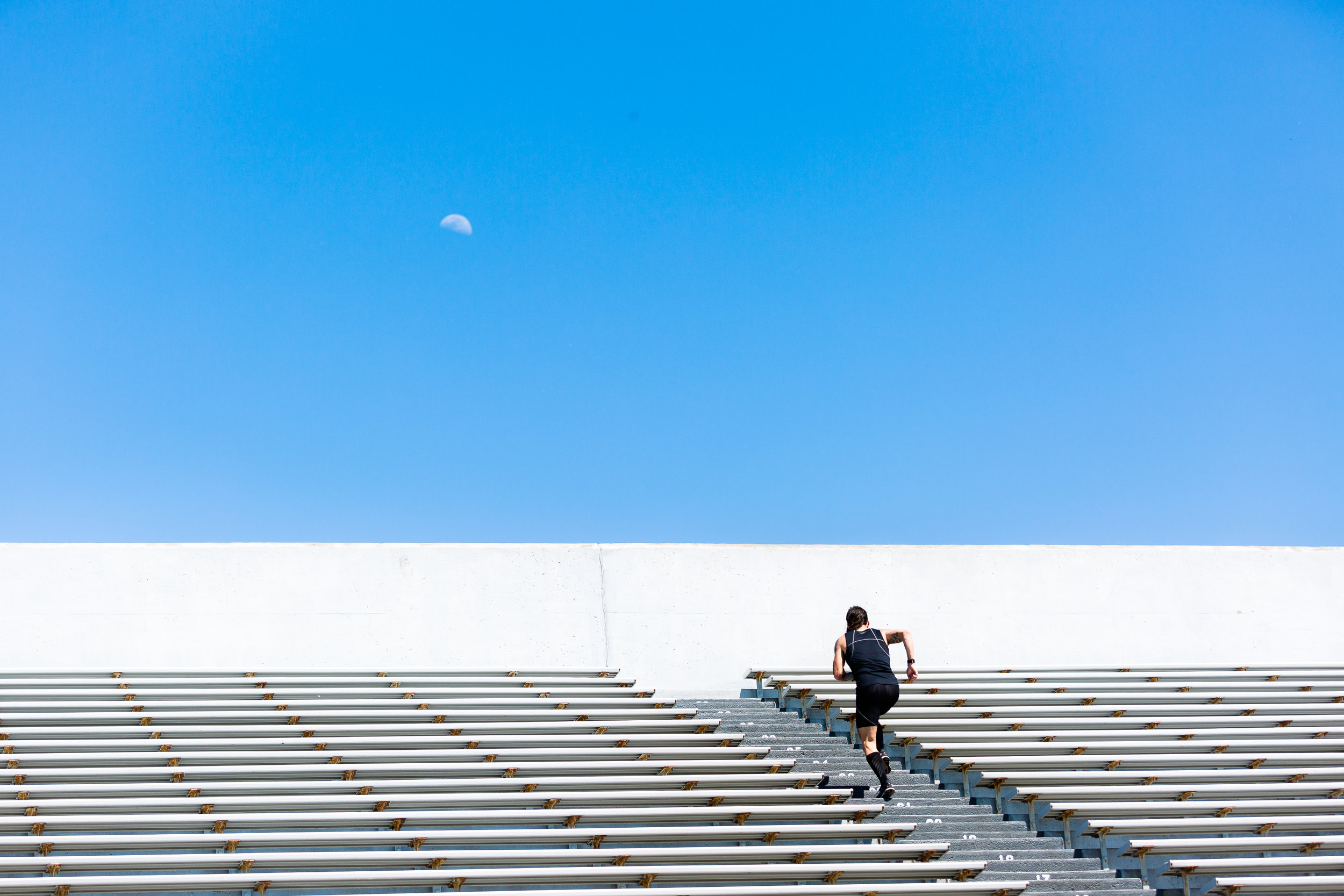 Mullet Man aka Kyle Dietz runs towards the moon in Davenport, IA.