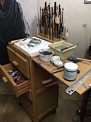 This is how my painting station looked at the end of work today. Time to clean up. Again!!! Yes, I have lots of brushes available for quick access. And my palette knives are attached to the far end of my taboret…