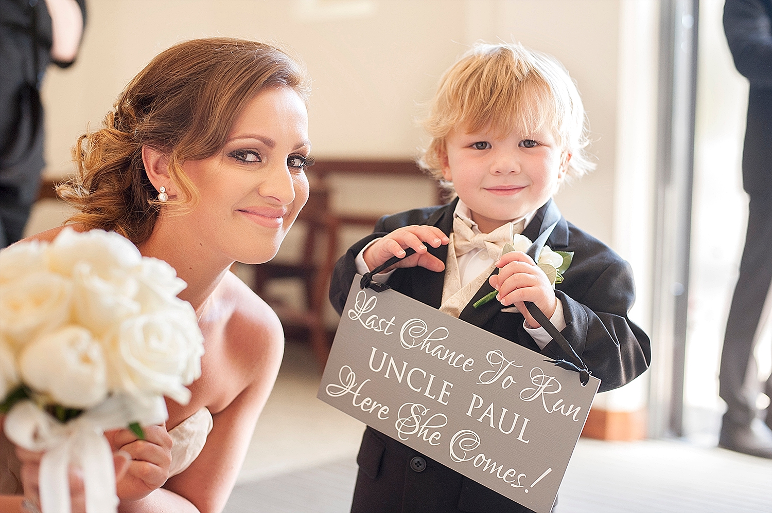 15_cute page boy with chalkboard sign wedding perth.jpg