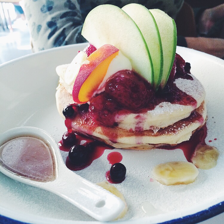 Sweet cakes with berries and maple syrup at Can Dende, Barcelona