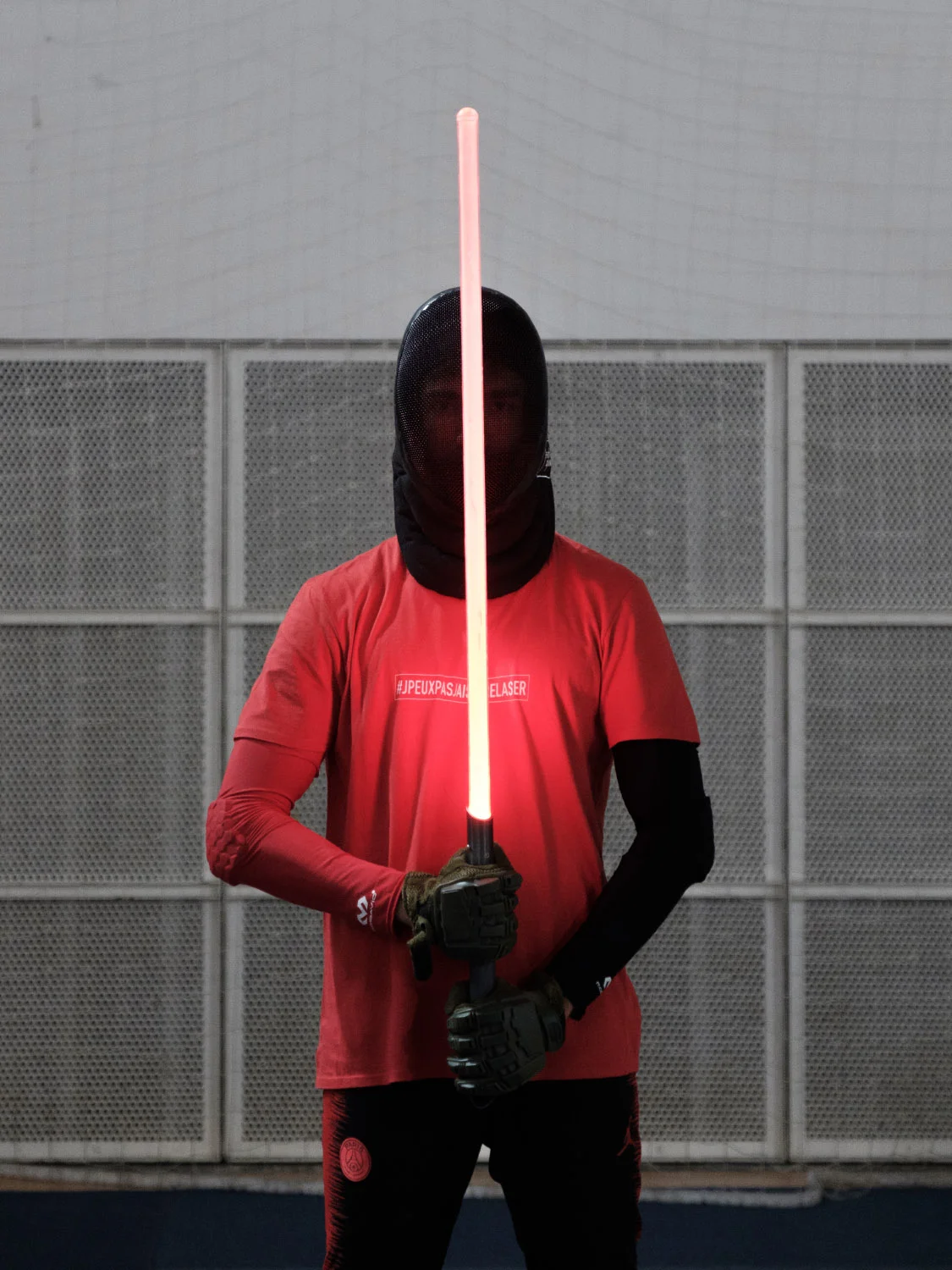 Combattant de sabre laser pendant l’Open de France 2019. Paris.