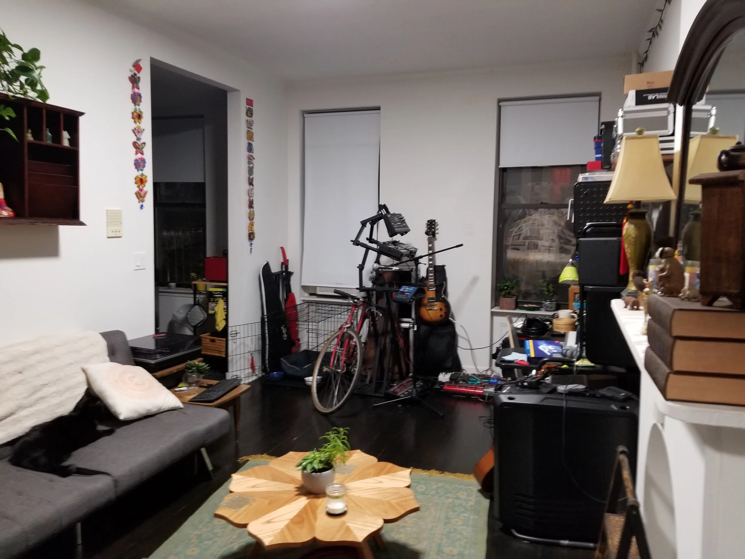 Their living space - fast forward from empty to being cozy and unpacked.