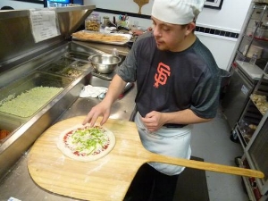 photo courtesy of smilingwithhopepizza.com