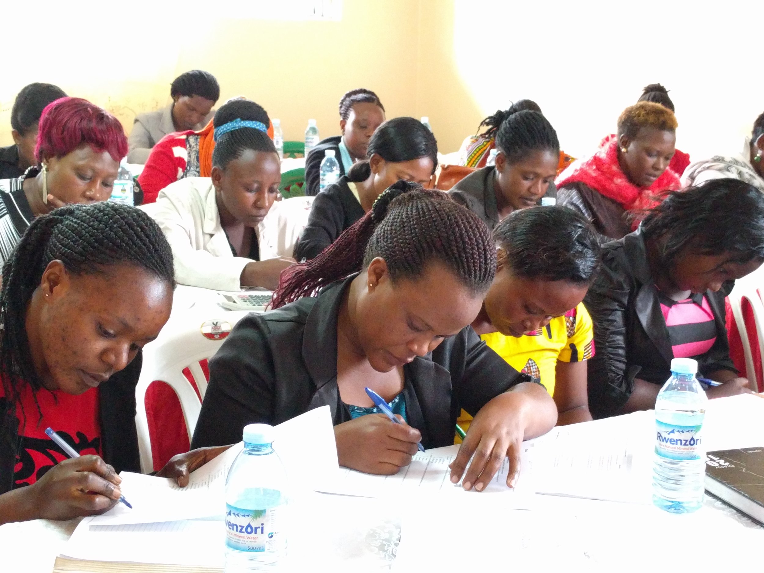BRAC staff members taking a little quiz during the training session