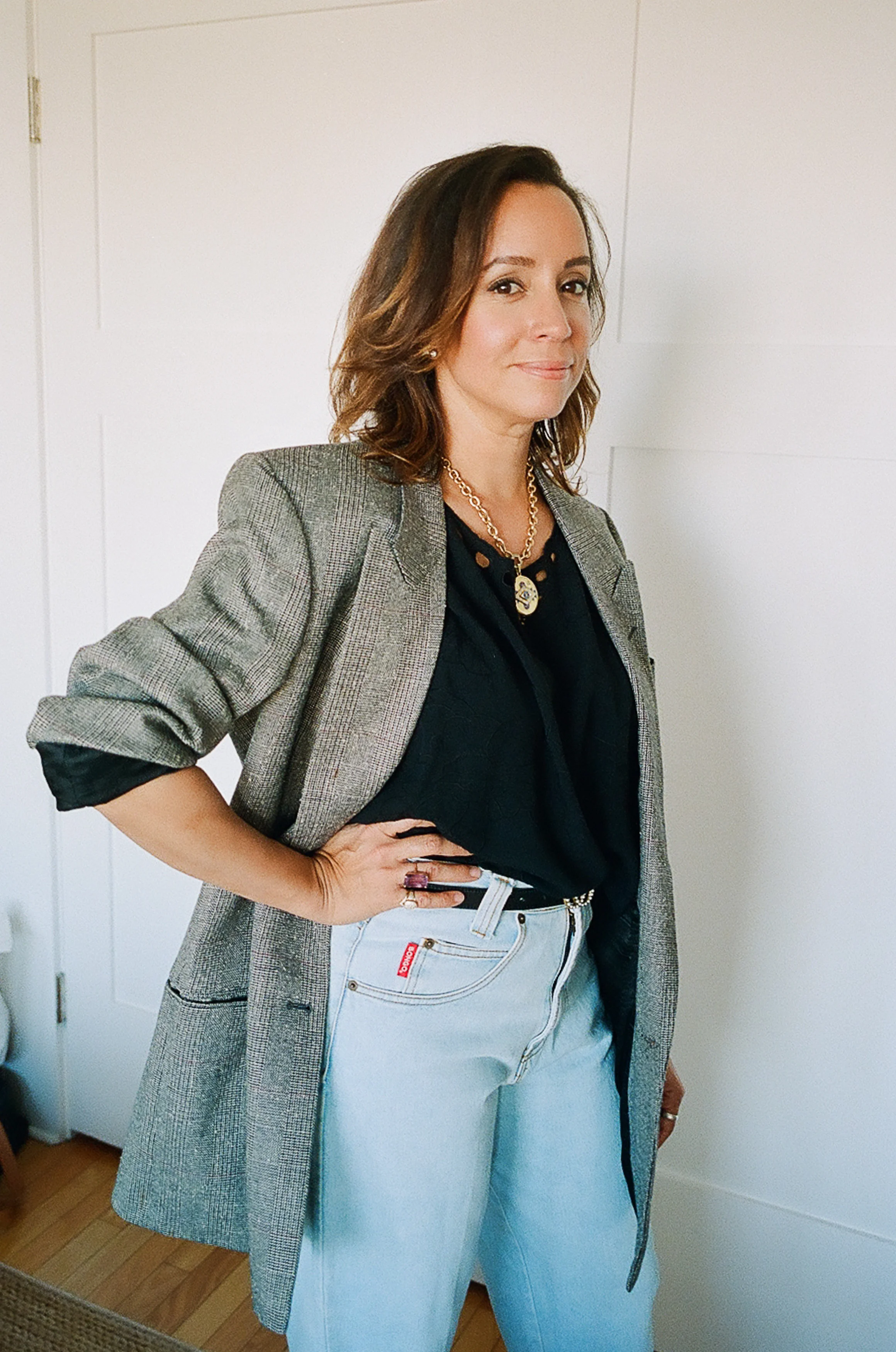 Lauren wears an oversized Encourage vintage blazer and her own vintage cutout tee + jeans.