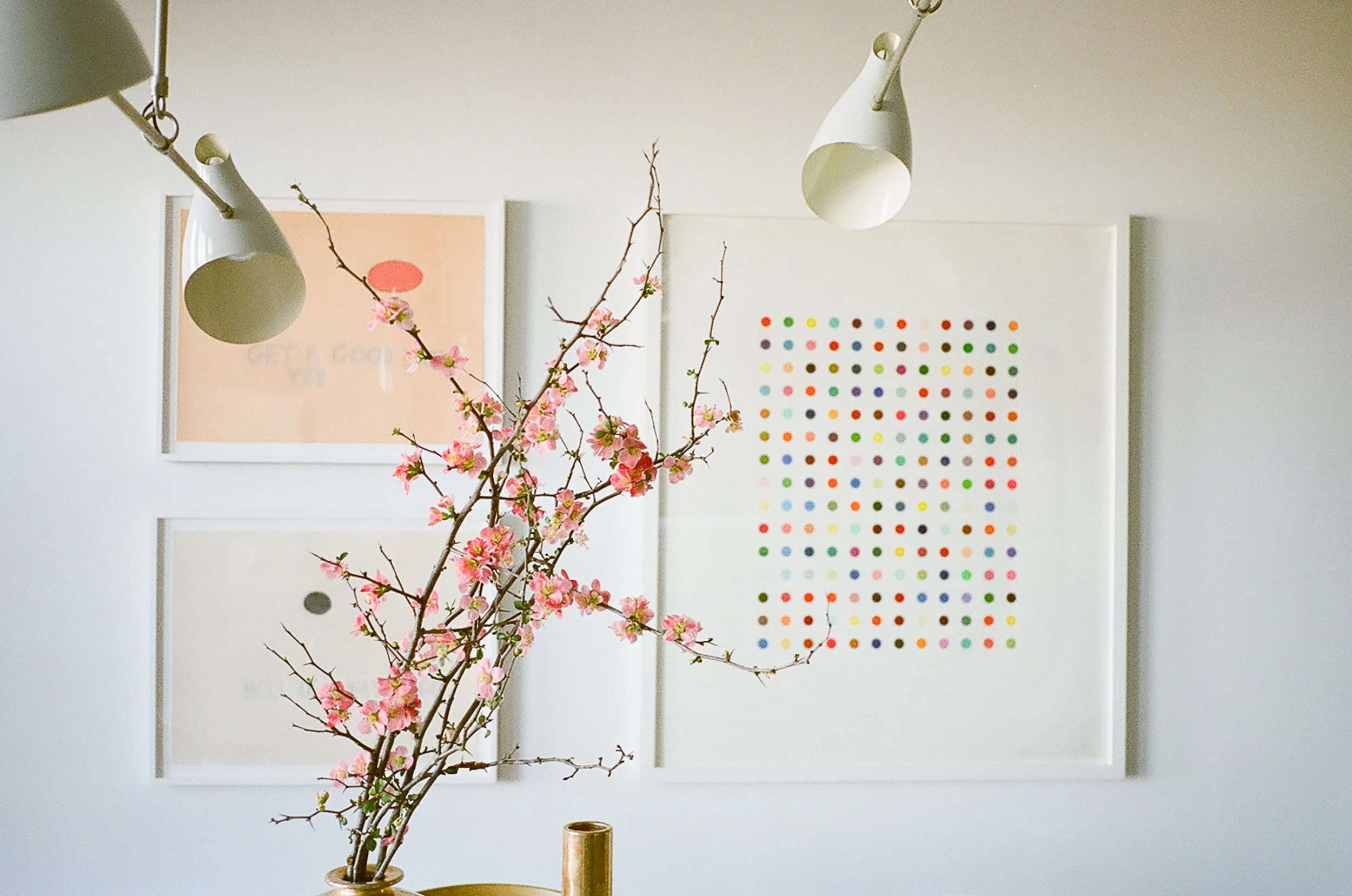 Artwork and branches in Lauren’s light filled kitchen.