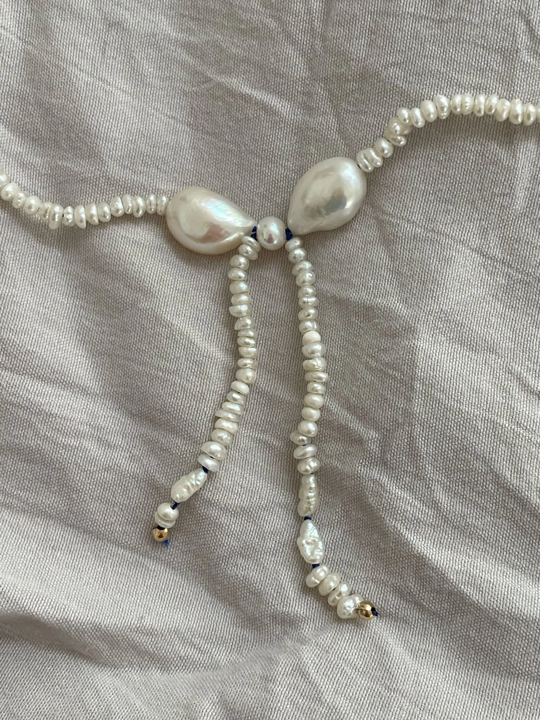 bitty seed pearl bow necklace