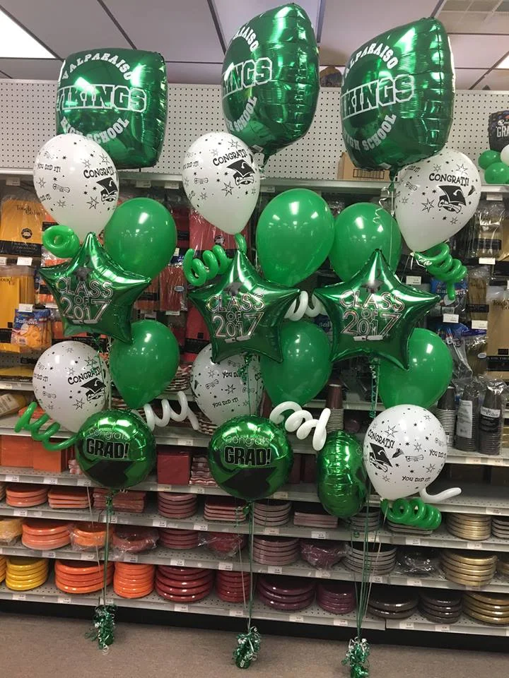 Green and White Graduation balloons