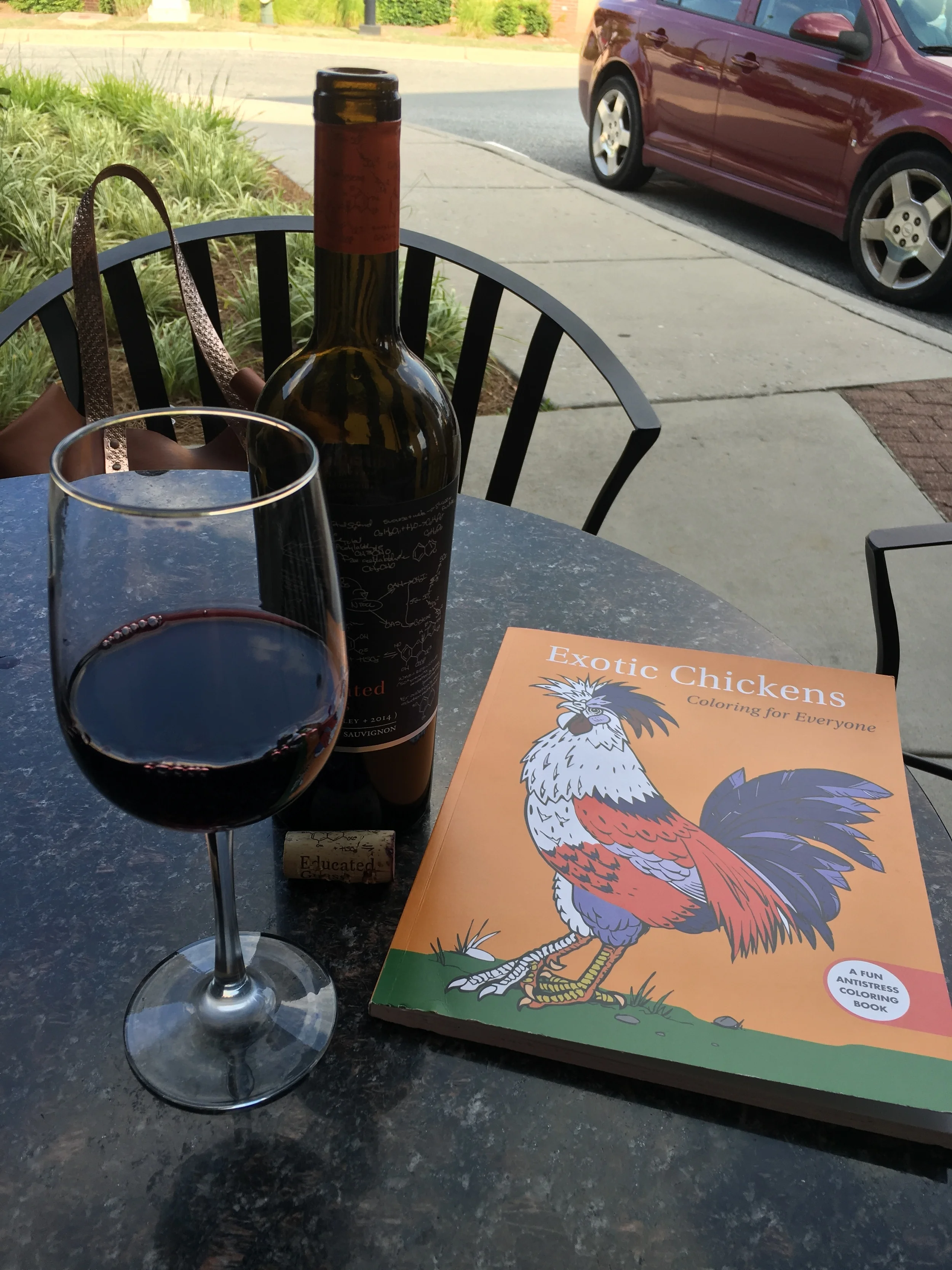 Good wine and a chicken coloring book. All on a lovely Summer afternoon.