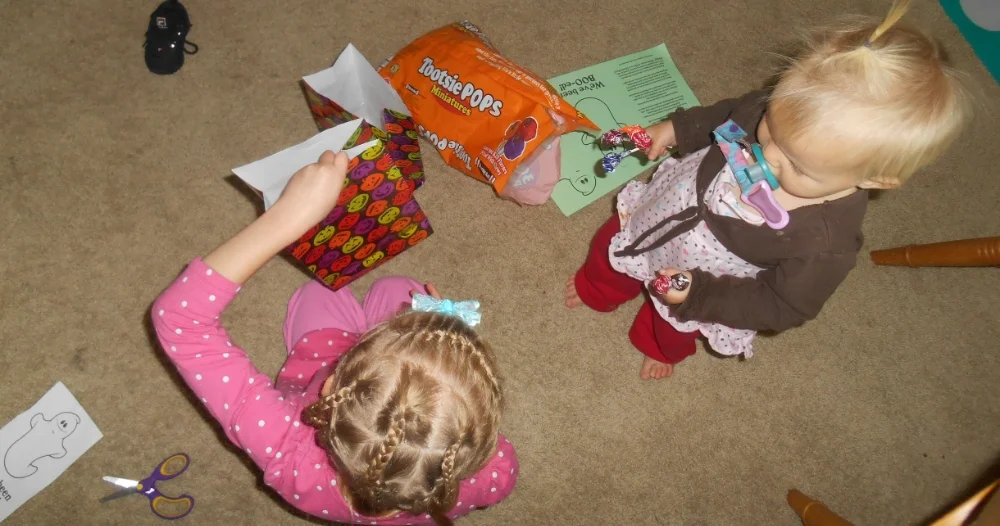 Getting our bags ready to Boo our neighbors!