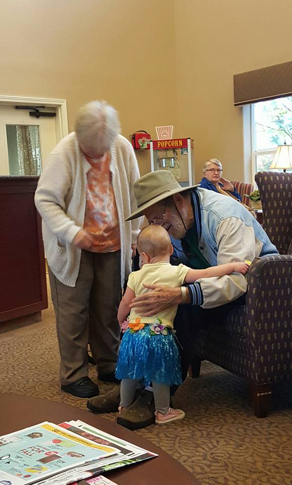 Jordan snapped this and the next picture of her little girl loving on some new friends.