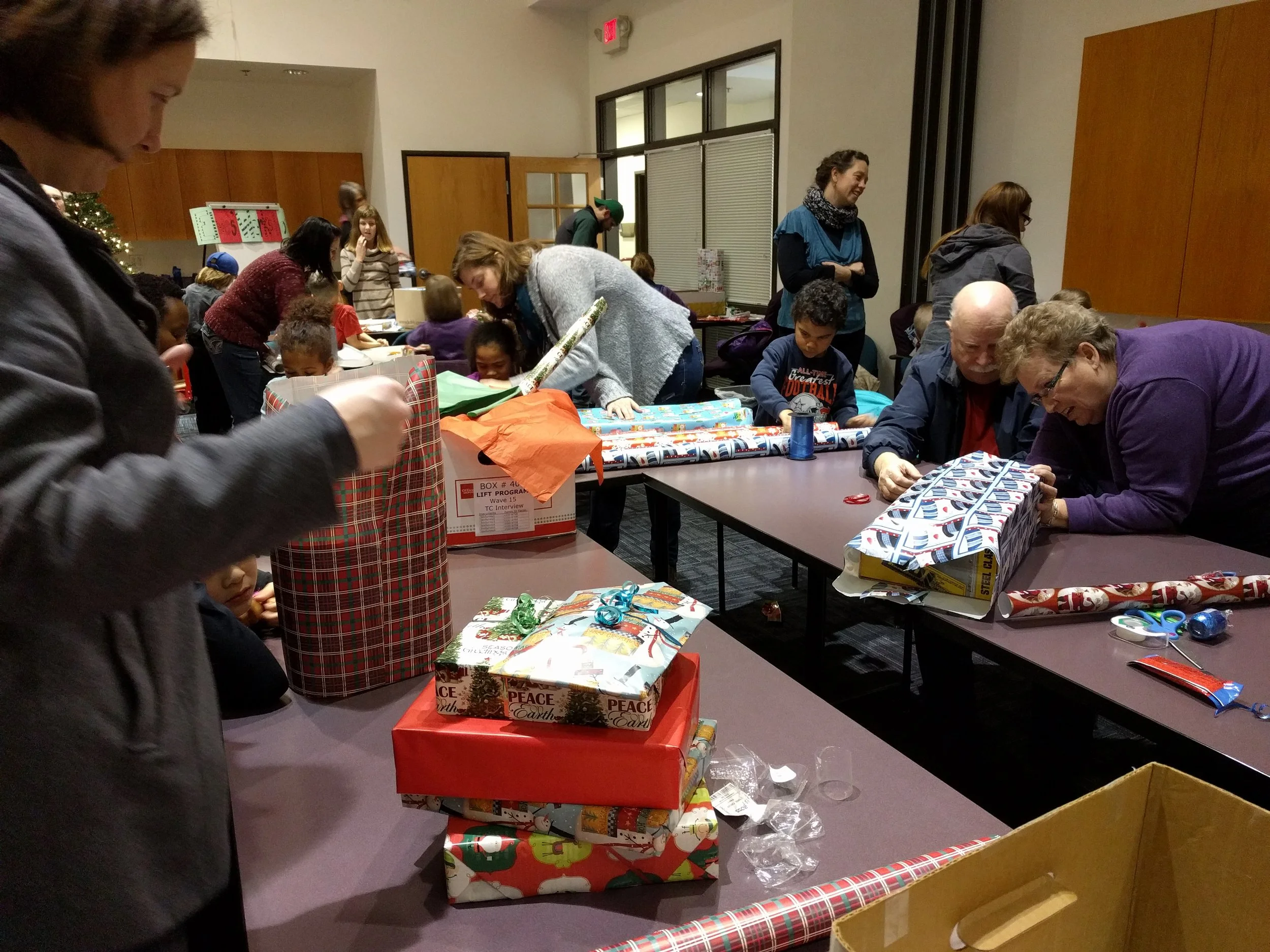 Dec 13 Wrapping Giving Tree presents
