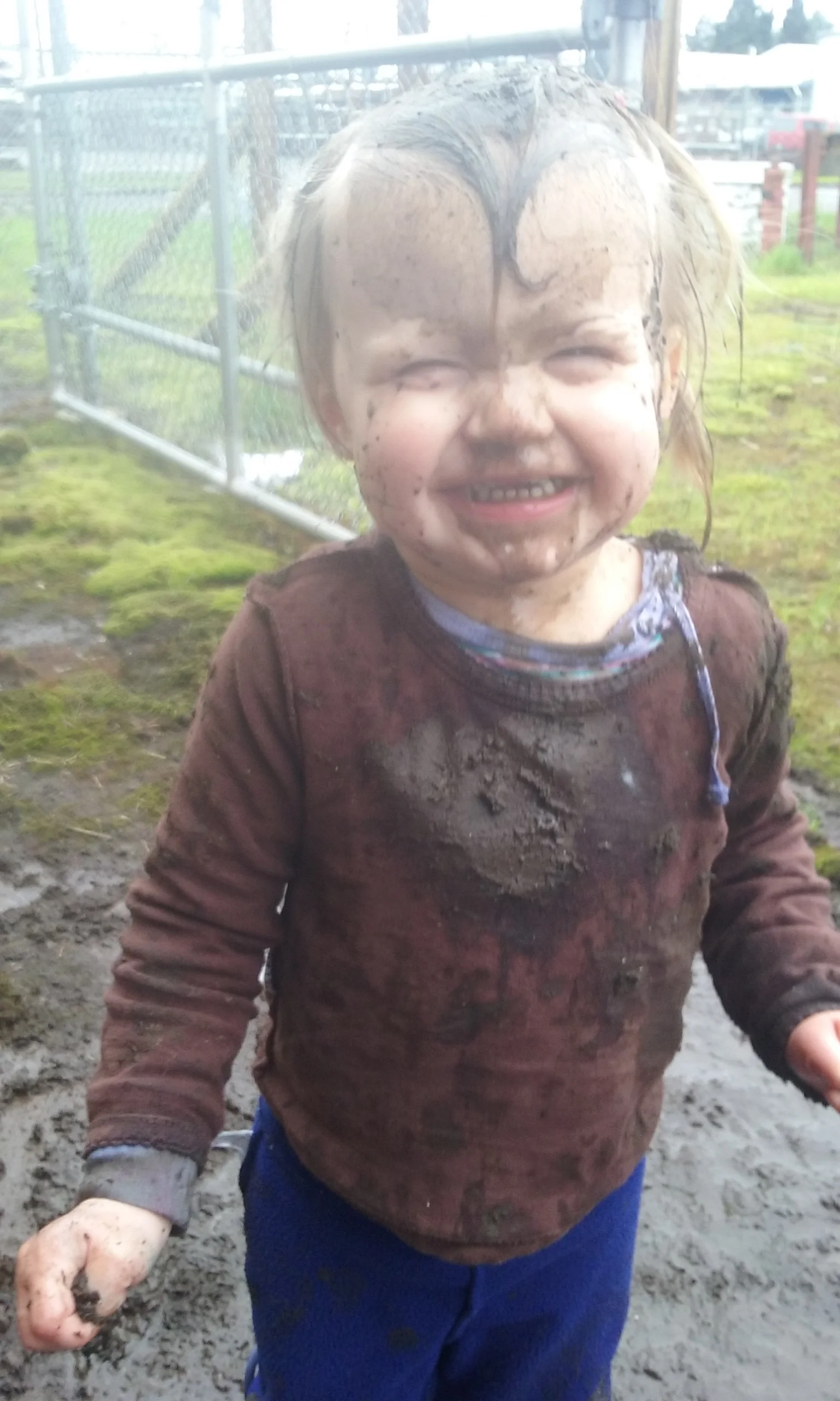 BONUS: There was a mud puddle outside, so after the activity where she got covered in paint, my little one decided to cover the paint with mud. 