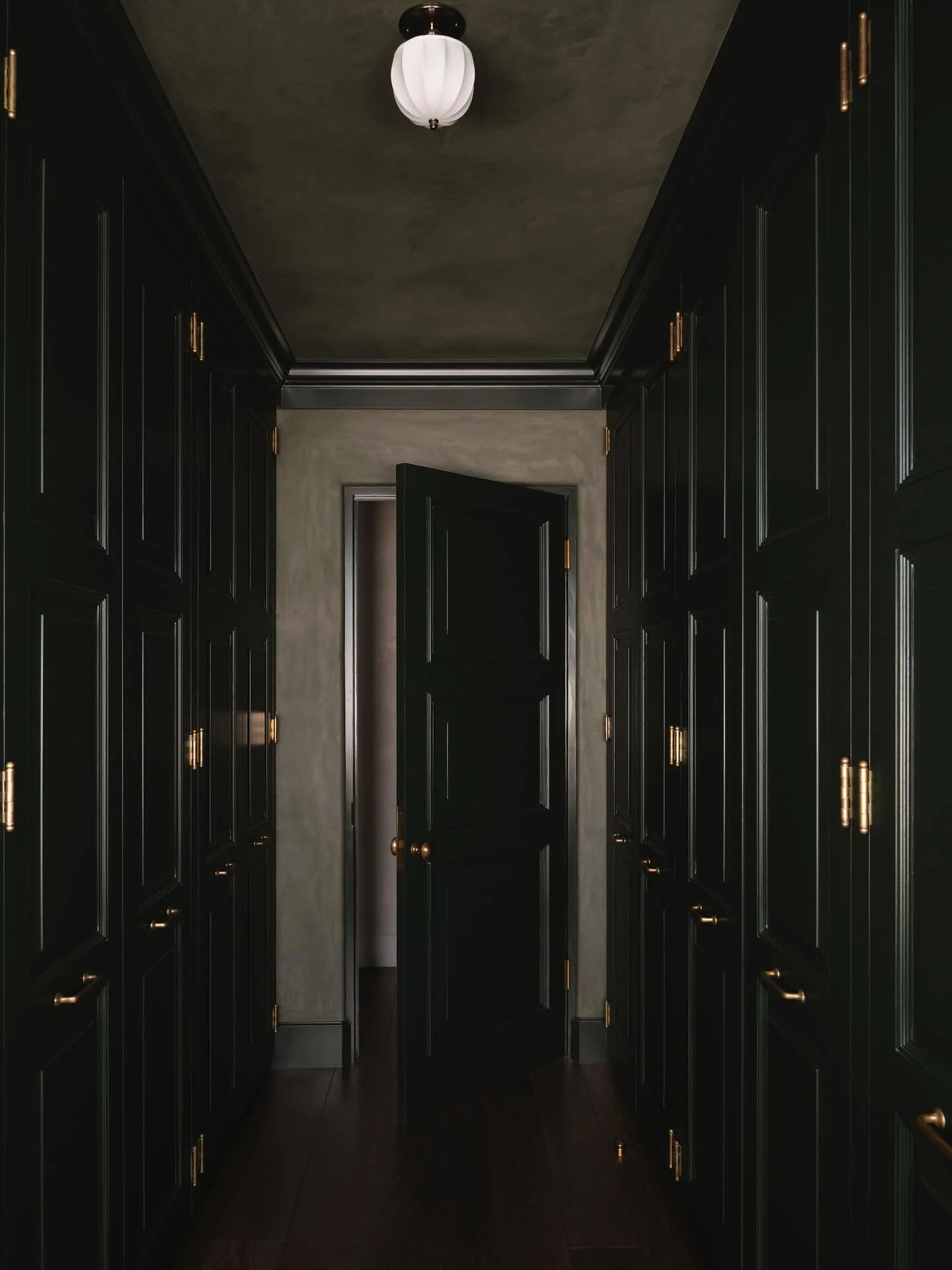 Never underestimate the transformative power of paint and plaster.  @farrowandball &ldquo;Studio Green&rdquo; is a favorite color and really shines here in &ldquo;his&rdquo; primary closet.  Swipe for the before! 

Interiors @lindsaygerberinteriors 
