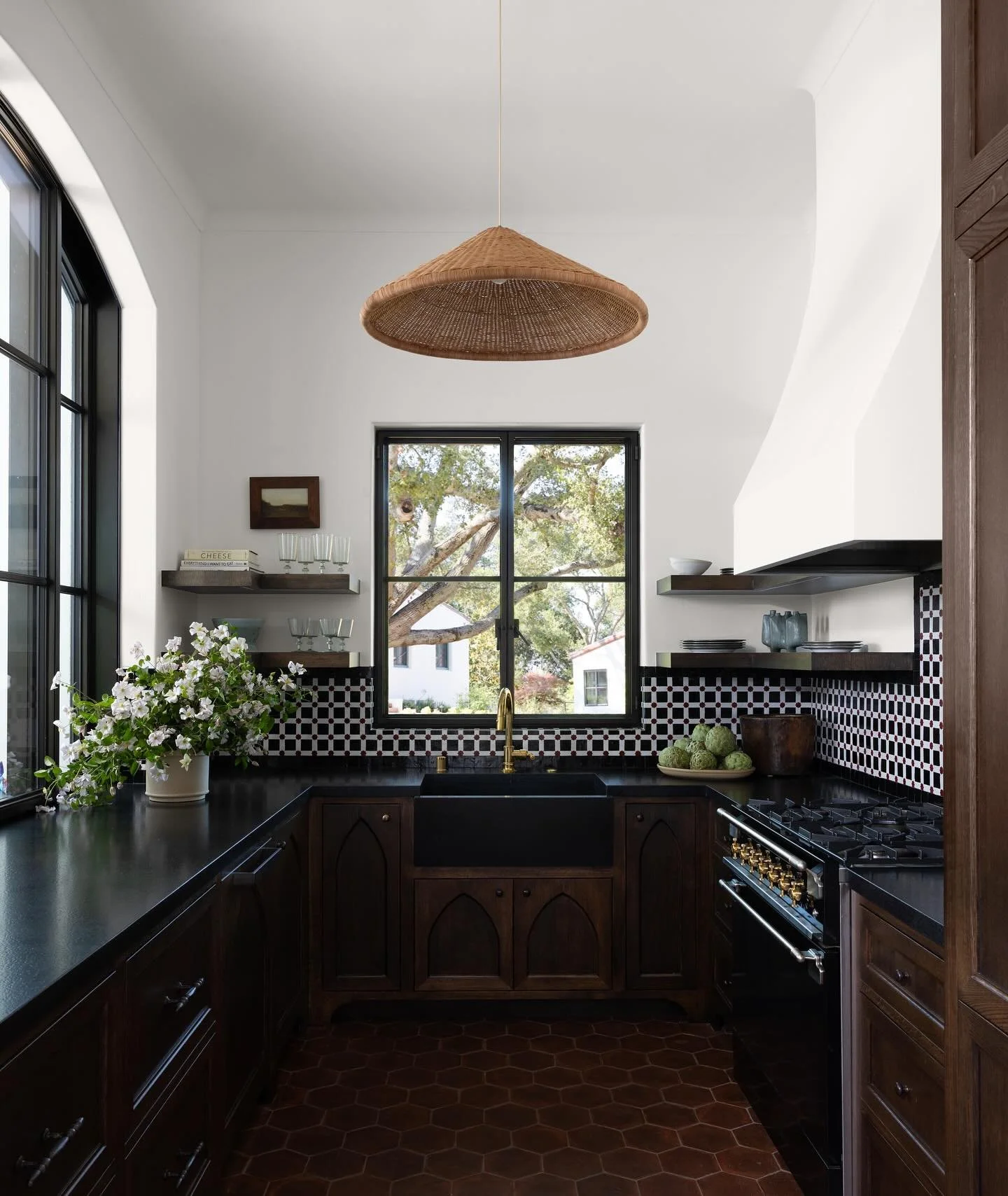 My goal when designing this guest house kitchen was to connect it with the main home - a very special 1920s Spanish home with a pedigreed past.  Tile selections, hardware and cabinet detailing were all designed to make it feel like it had been built 