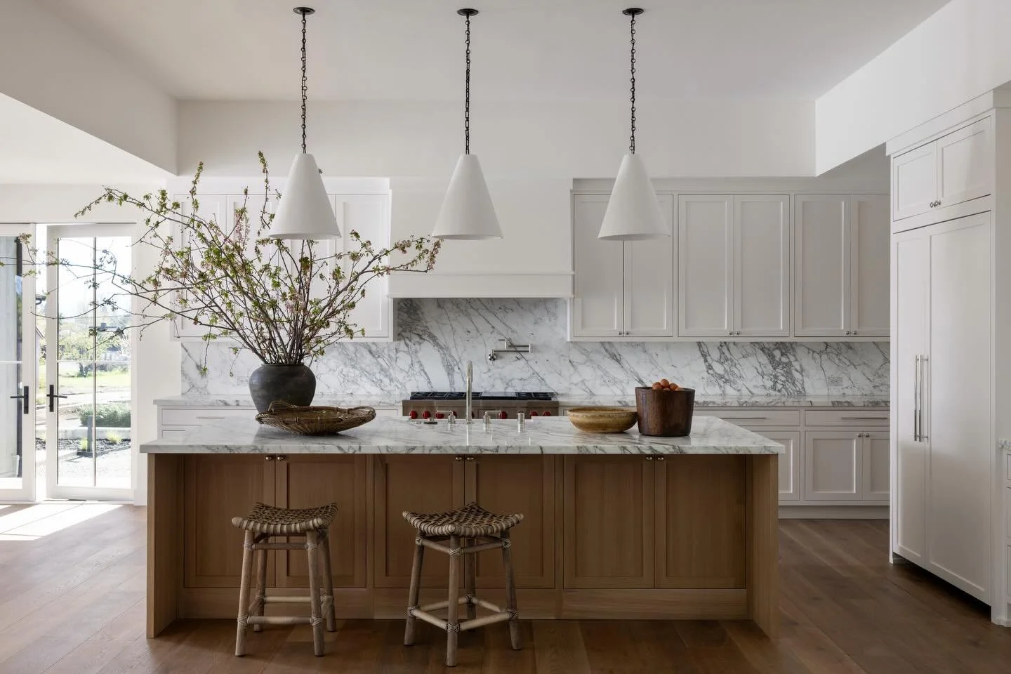 The kitchen in our Napa project for @rivieradevelopmentcompany Surrounded by acres of vines this kitchen is light filled, warm and built for welcoming friends and family to one of the most beautiful wine valleys in the world. 📸 by @bessfriday