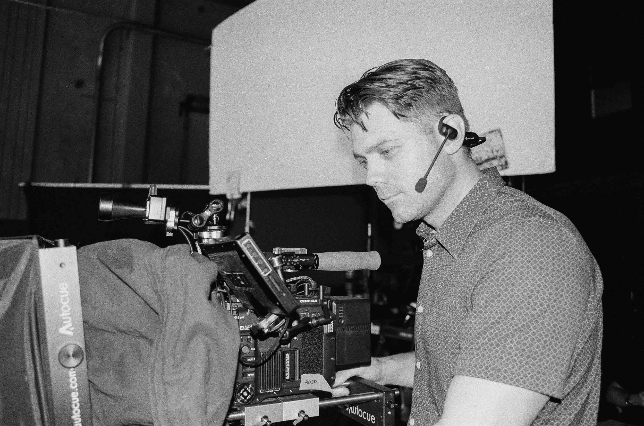 Michael Gauthier Cinematographer Director of Photography operating a RED Raptor XL Camera with a Teleprompter 