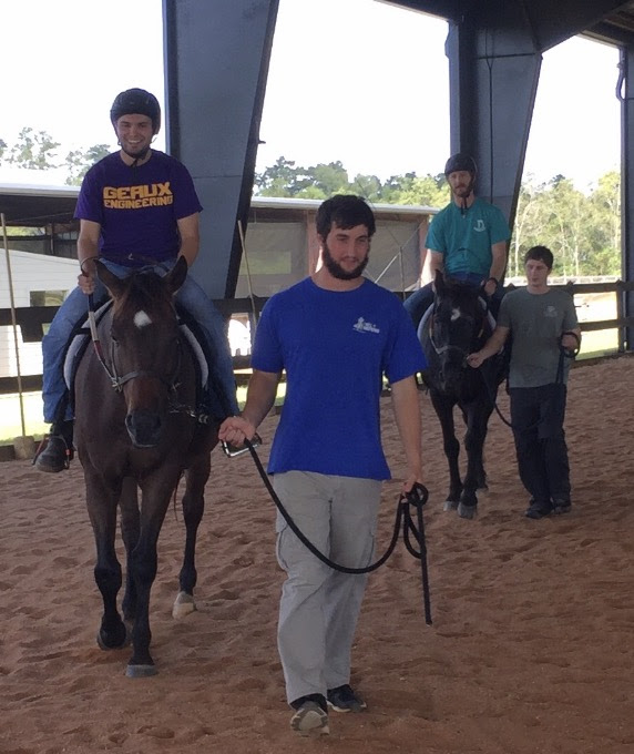 Alex and Dexter are the riders and Brice and Scott are the leaders; demonstrating some of what they do fore their Pastoral Ministry at New Heights Therapy Center..jpg