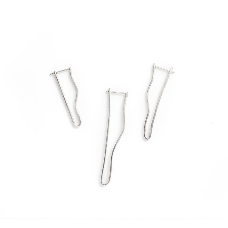 squarespaceClipEarringsontableSilver.jpg