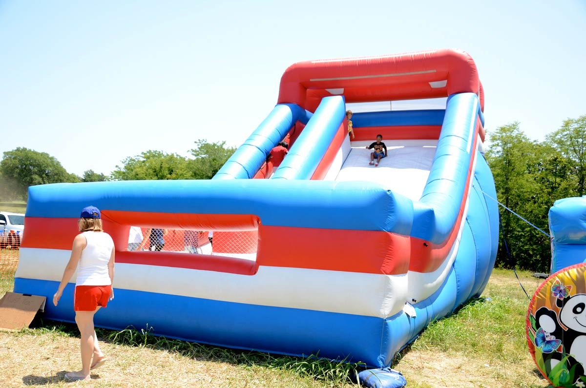 Giant Slide with kids jumping on it