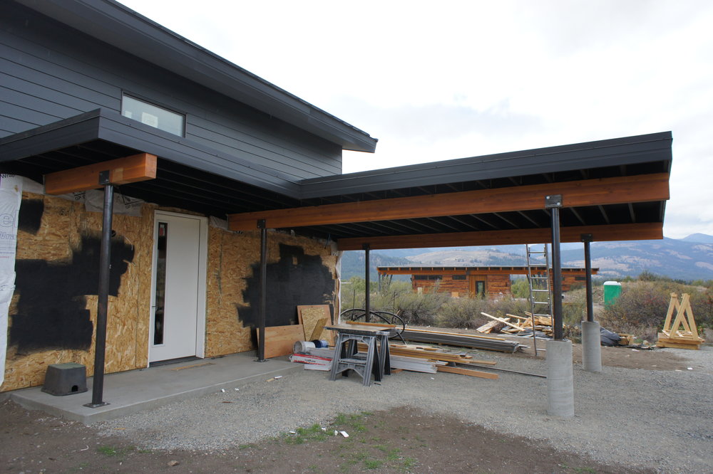  We had custom steel posts fabricated to support the porch and carport. 