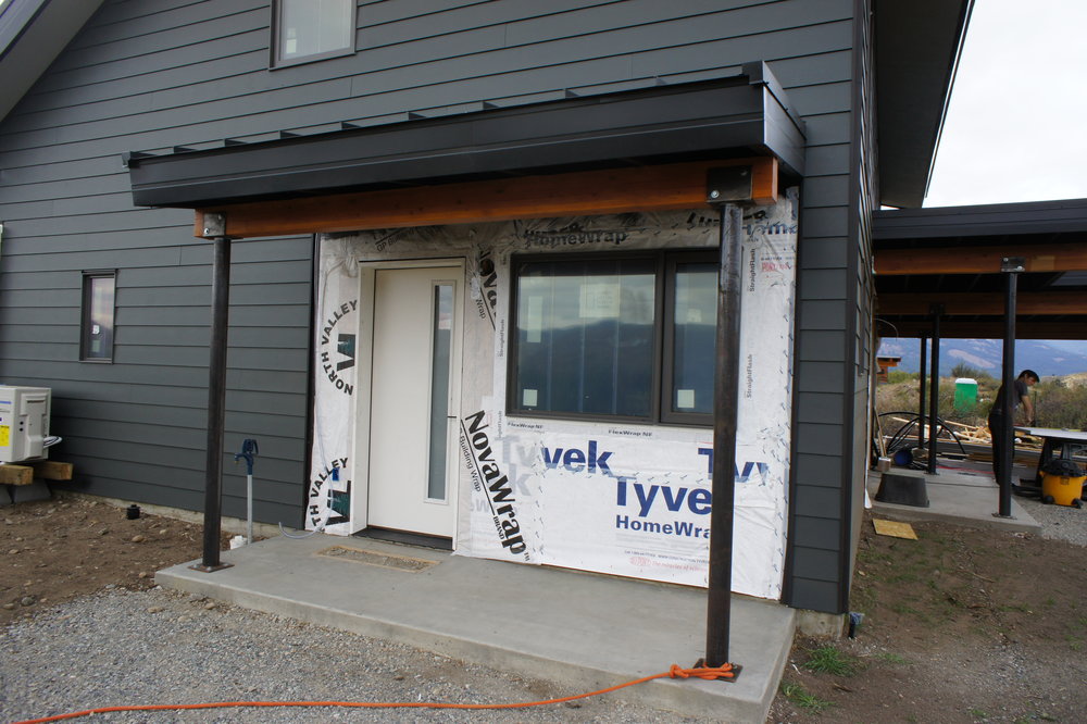  This door serves as a separate entrance with its own mini-porch and driveway. 