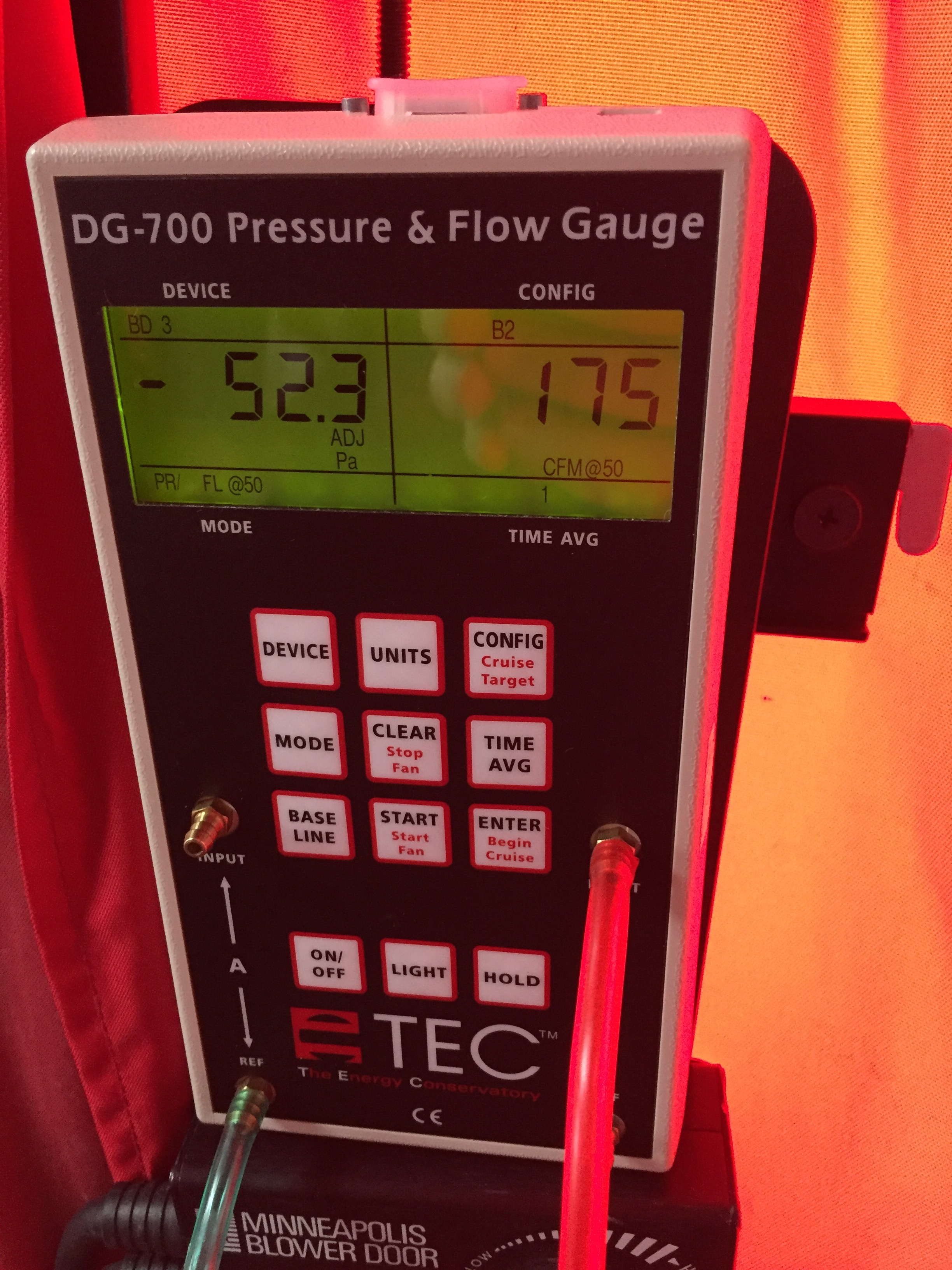 Our blower door results are in, and we're very pleased with them. To calculate air changes per hour (ACH), we multiplied the CFM number on the right by 60 and divided by the number of cubic feet of the house.
