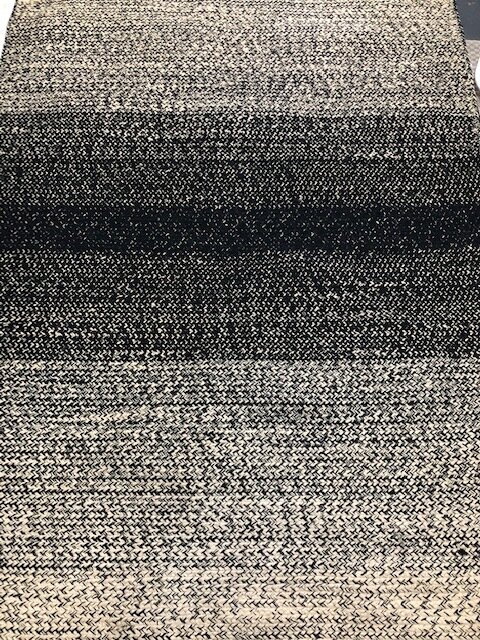 Jute and black rug