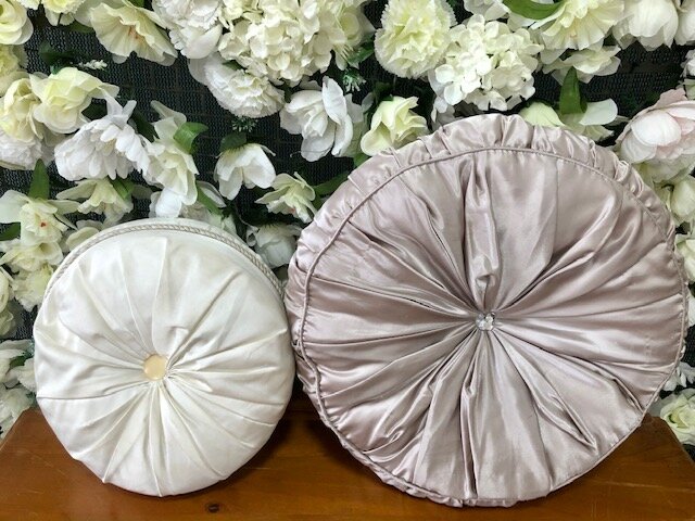 Round satin cushions
