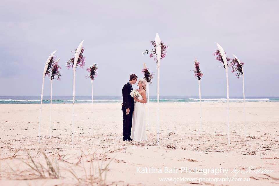 palm poles beach wedding.jpg