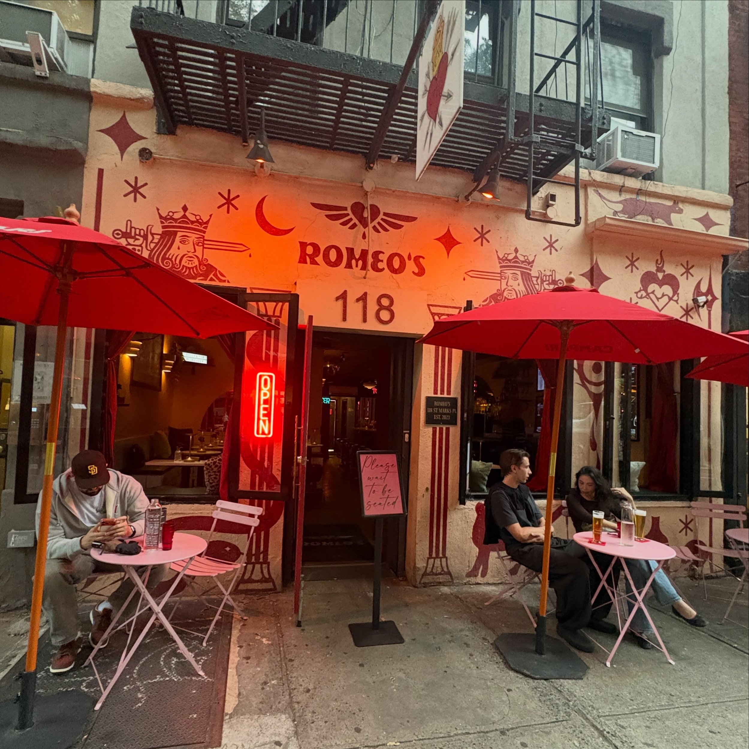 @romeosnyc 
118 St Marks Place 

Hours:
Mon, Tue, Wed, Thur, Fri
4:00 PM - 2:00 AM
Sun, Sat
2:00 PM - 2:00 AM
