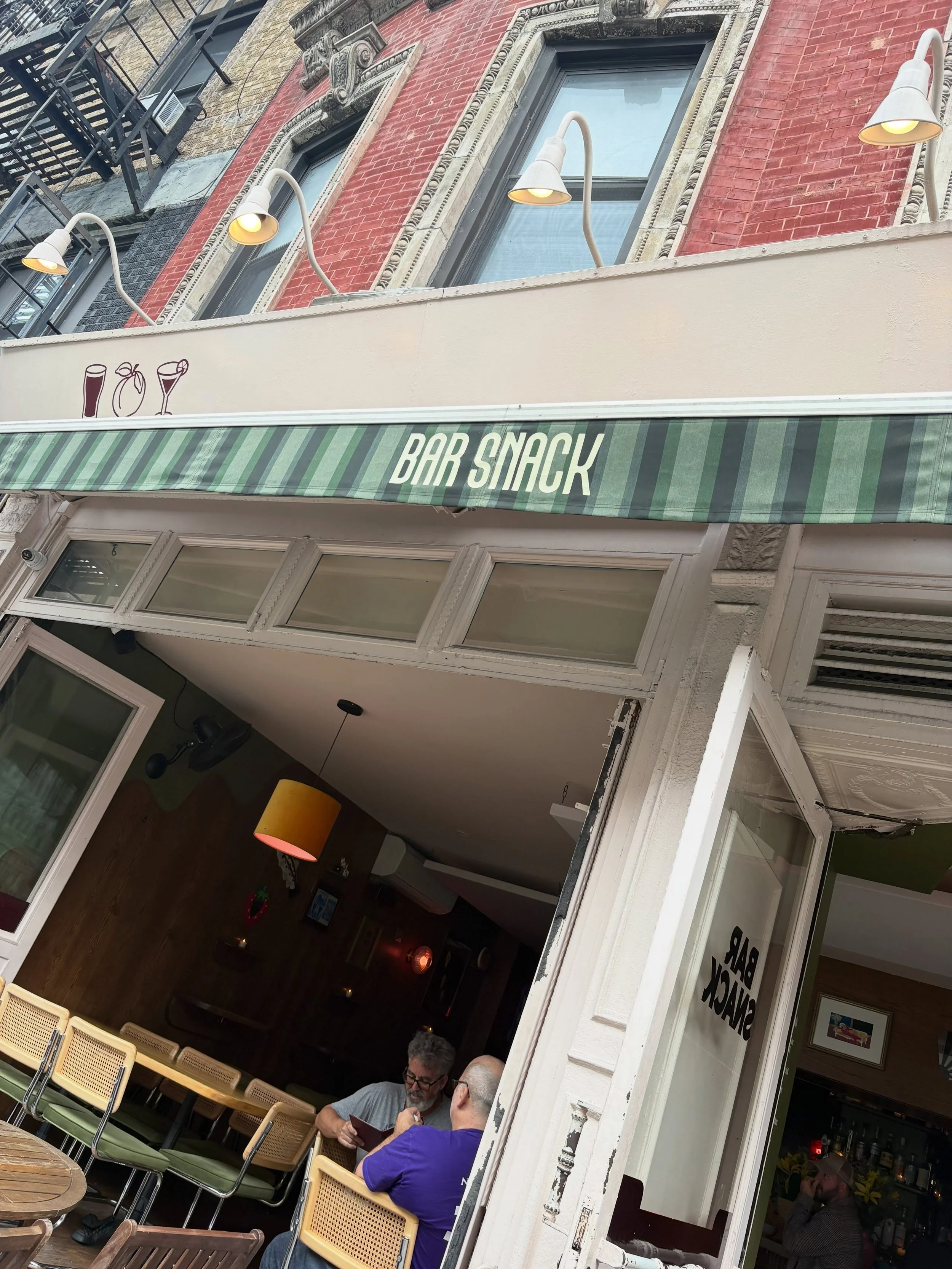 @barsnack.nyc 
92 2nd Ave

Hours:
Sunday &ndash; Thursday &bull; 2 p.m.&ndash;1 a.m.
Friday - Saturday &bull; 2 p.m.-2 a.m.
Happy Hour:
Sunday - Thursday &bull; 2 p.m.-6 p.m.
