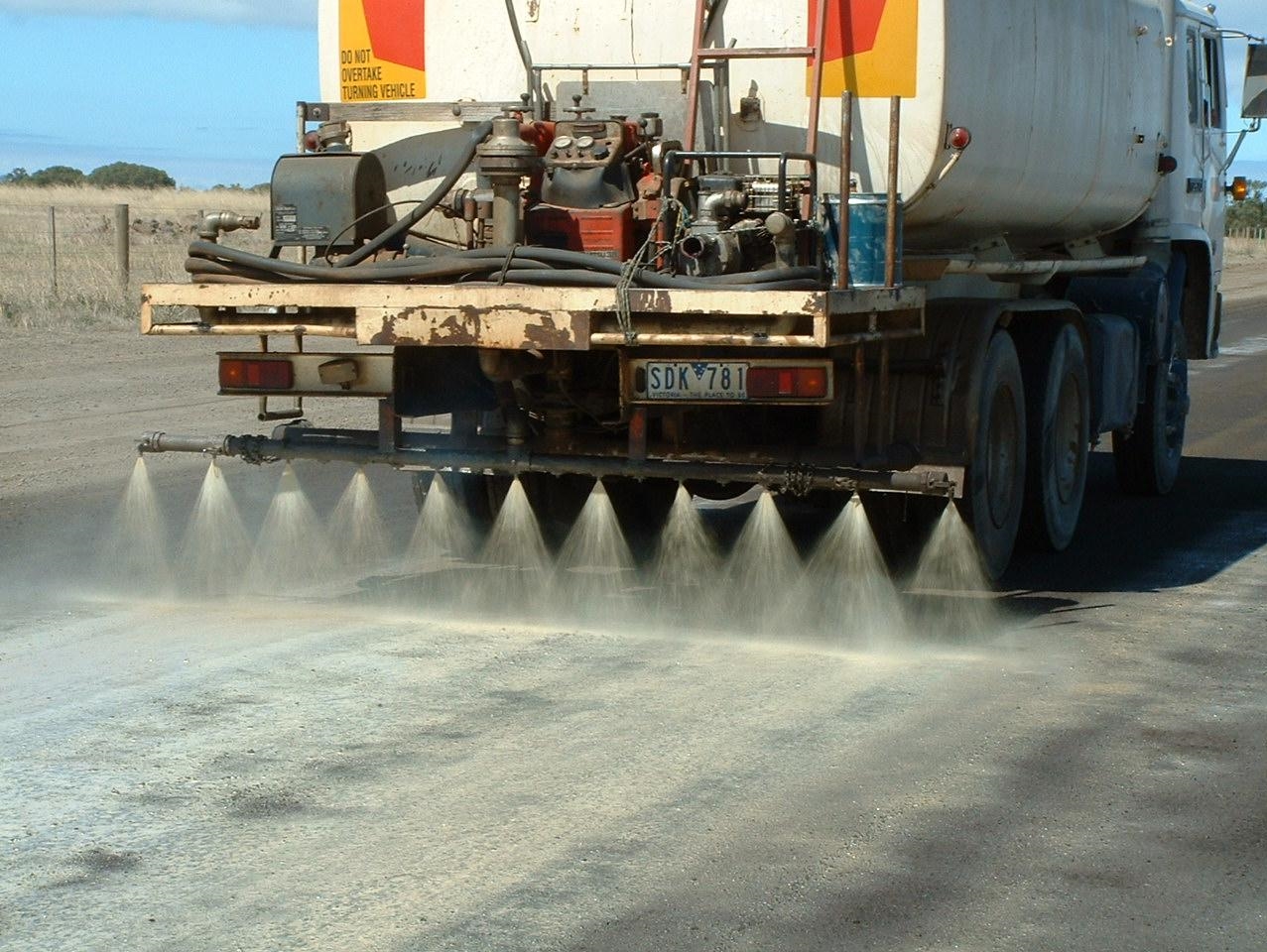  The Soilbond dust control solution being applied with a water cart spray bar 