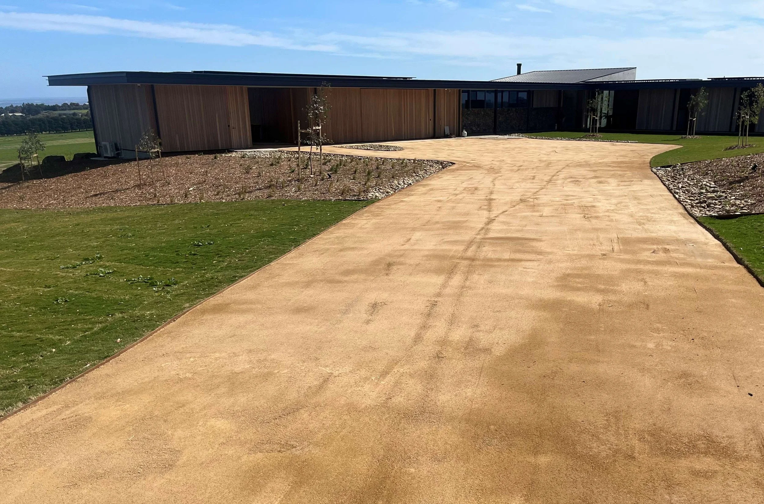 Residential granitic sand driveway stabilised with Soilbond