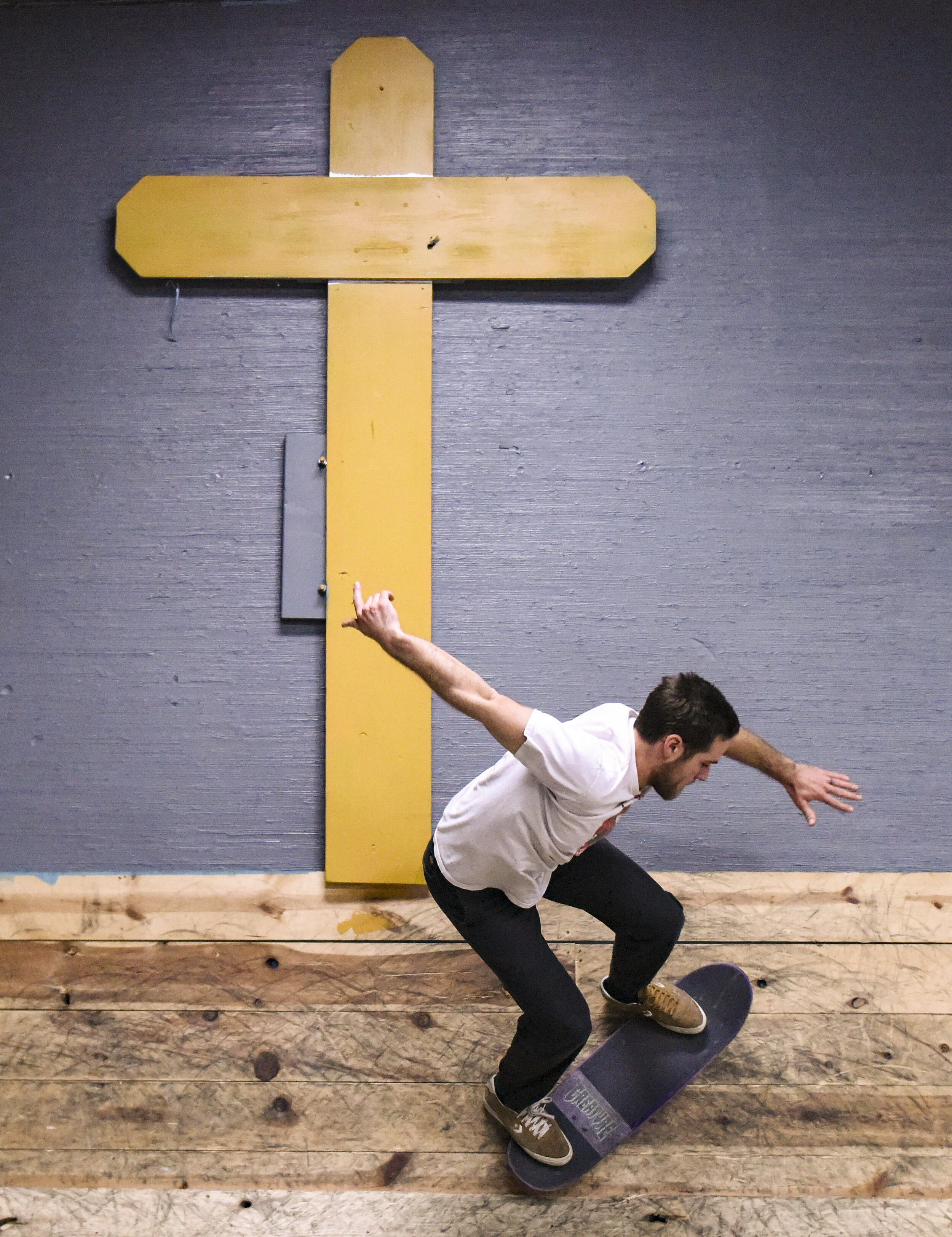  Connor LaBorde, skate pastor and associate director of The Center in Davenport, rides his board at Dec. 6 at The Center. LaBorde said he is hopeful The Center can get Skate Church back up and running soon despite issues with its insurance.  